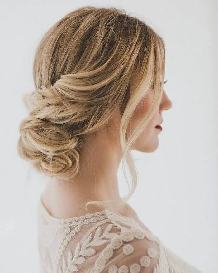 Light Brown Loose Bun With Face-Framing Tendrils Light Brown Loose Bun With Face-Framing Tendrils — Classy Bridal Hairstyles