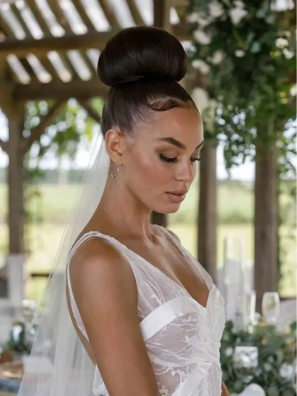 Sleek High Top Knot Bun With Baby Hairs Sleek High Top Knot Bun With Baby Hairs — Classy Bridal Hairstyles