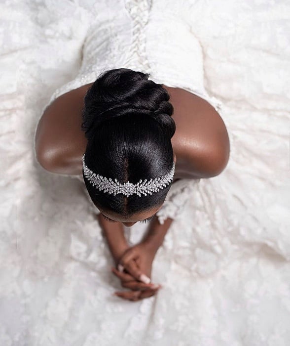 Smooth Twisted Black Chignon With Tiara Smooth Twisted Black Chignon With Tiara — Classy Bridal Hairstyles