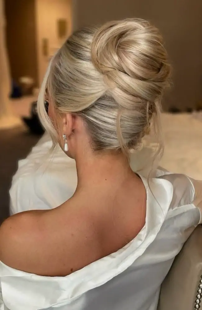 Ash Blonde Smooth Chignon Bun Ash Blonde Smooth Chignon Bun — Classy Bridal Hairstyles