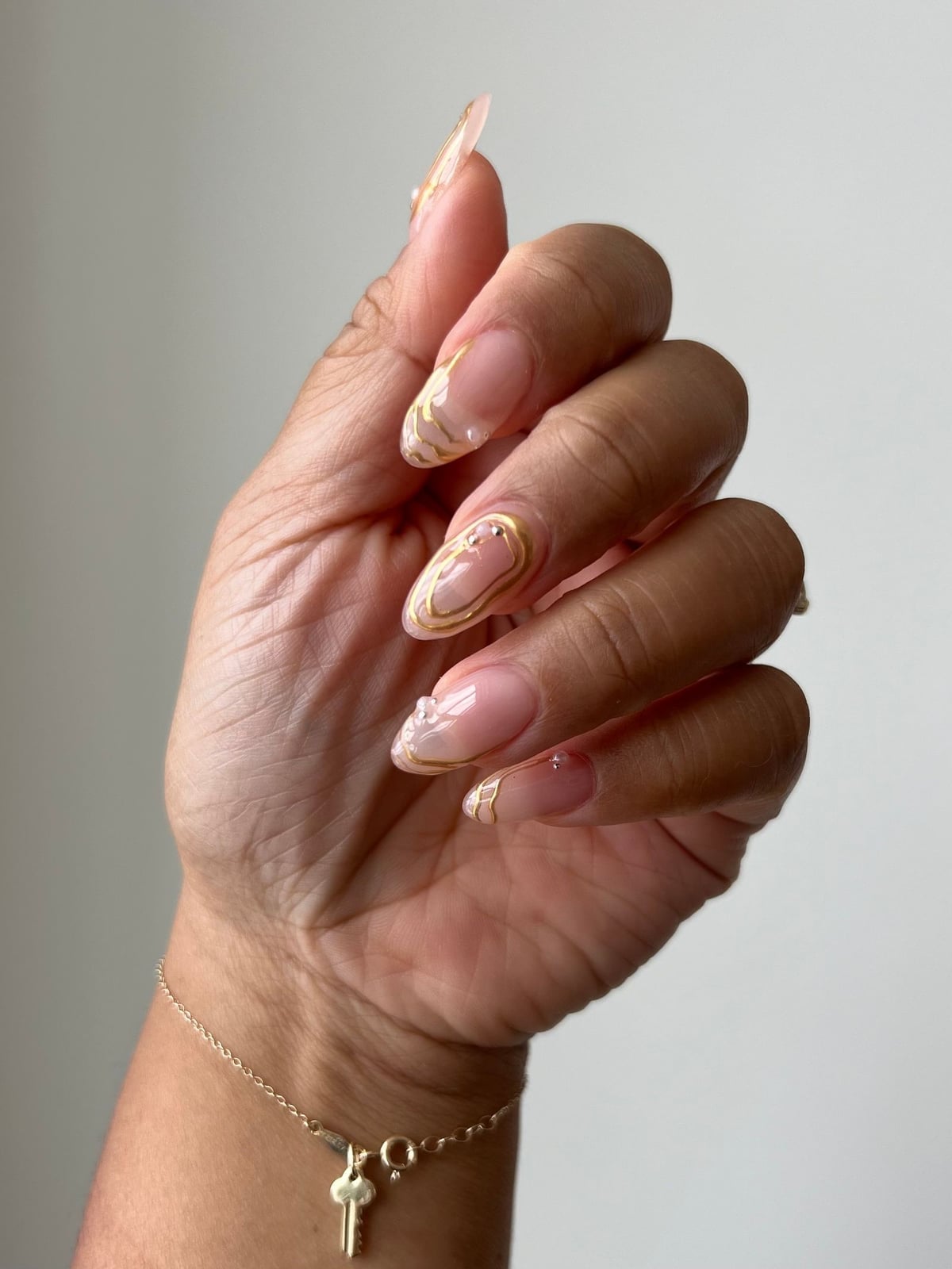 Long Almond Gold Foil Swirls Long Almond Gold Foil Swirls — Classy Bride Nail