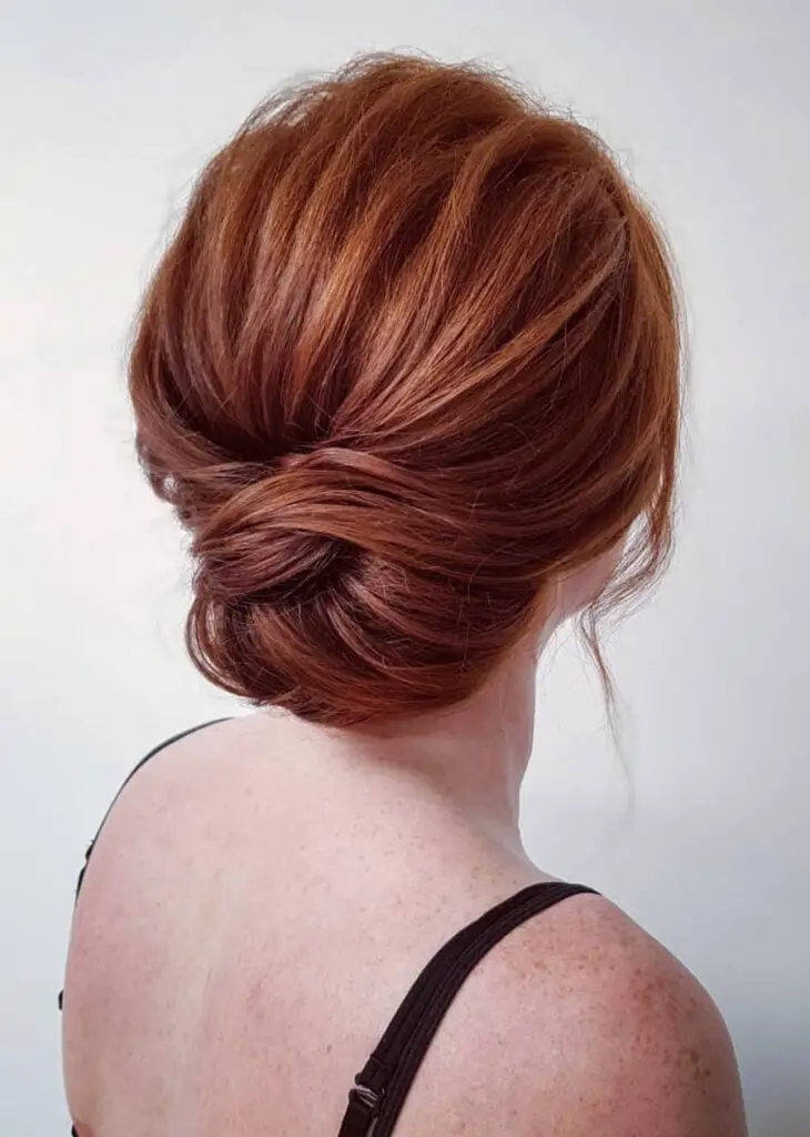 Auburn Low Twisted Bun Auburn Low Twisted Bun — Classy Bridesmaid Hair