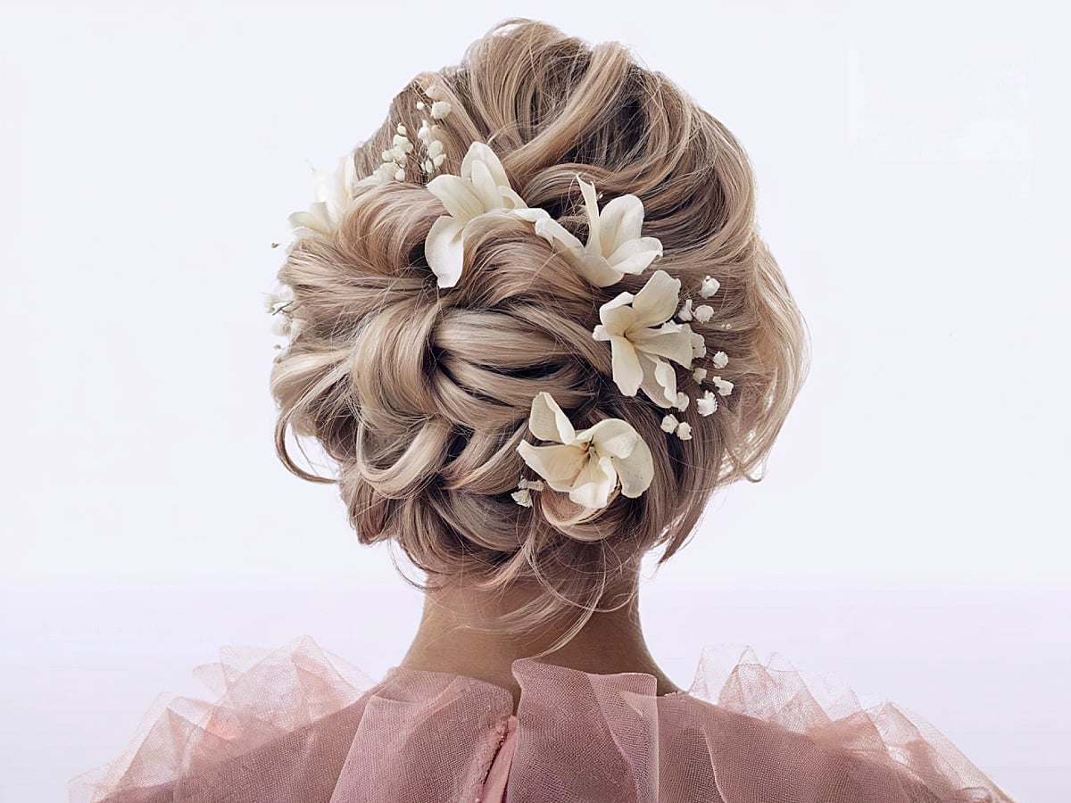 Voluminous Blonde Updo With Floral Accents — Classy Bridesmaid Hair Updo