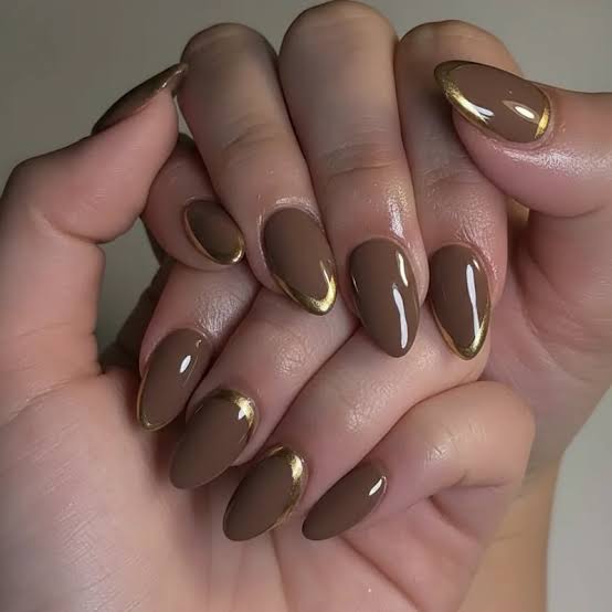 Medium Almond Nails With Thin Gold French Tips Medium Almond Nails With Thin Gold French Tips — Classy Brown Almond Nails