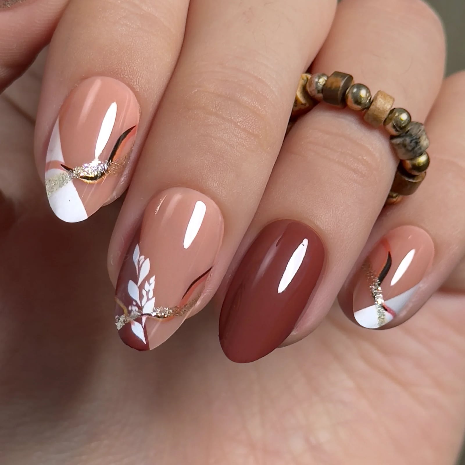 Medium Almond Nails With White French And Floral Art Medium Almond Nails With White French And Floral Art — Classy Brown Almond Nails