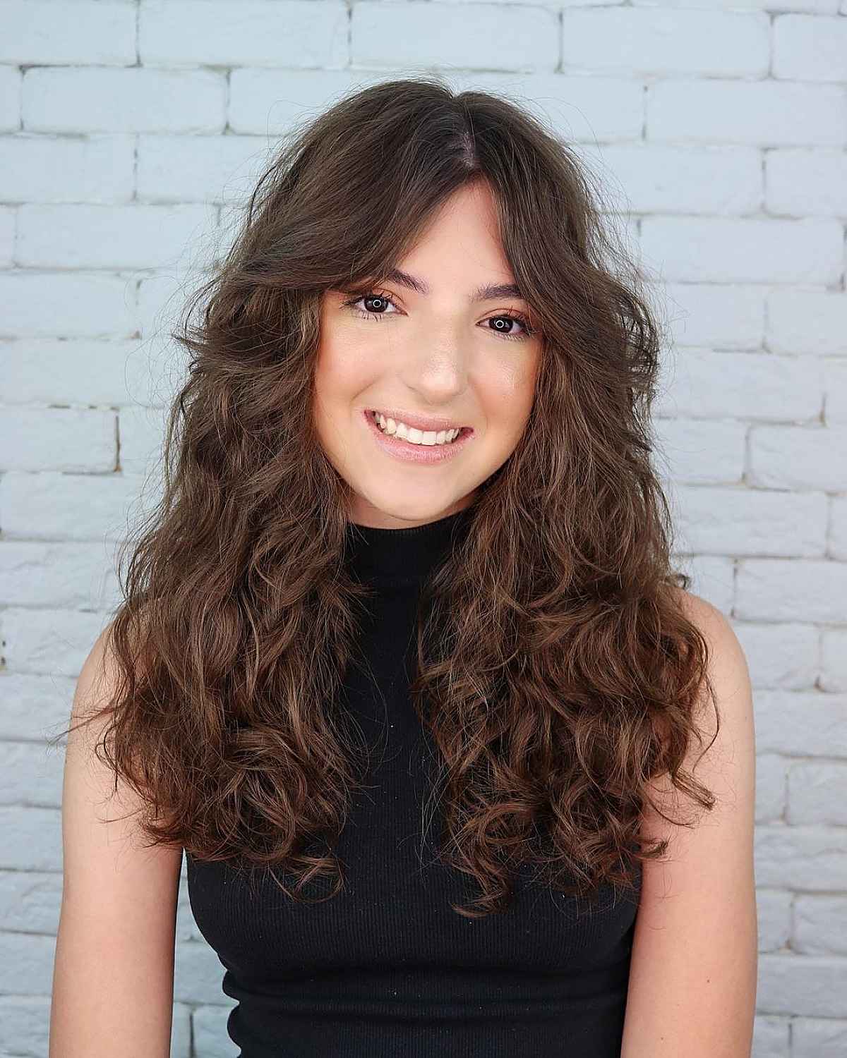 Mid-Back Face-Framing Layers With Highlights Mid-Back Face-Framing Layers With Highlights — Classy Brown Curly Hair