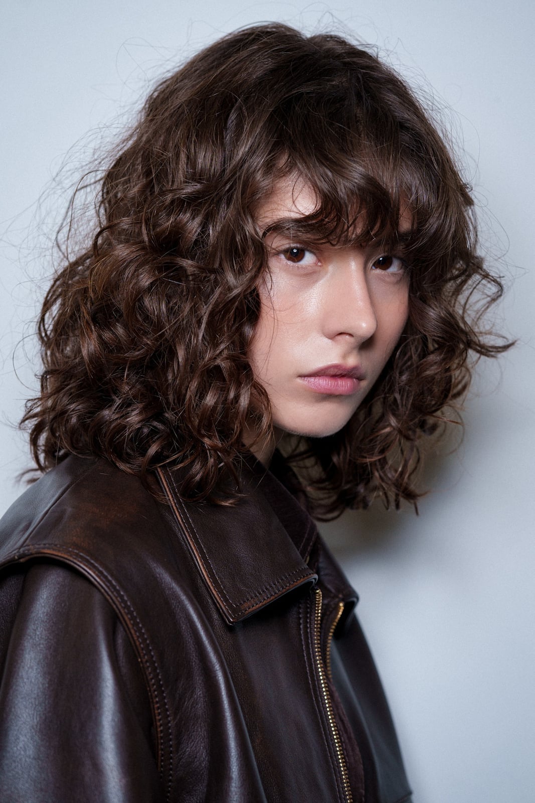 Shoulder Length Shag With Full Bangs Shoulder Length Shag With Full Bangs — Classy Brown Curly Hair