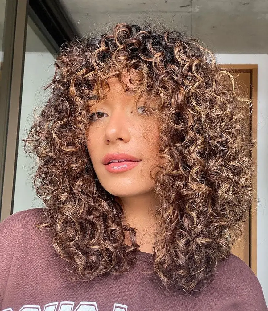 Collarbone Curly Hair With Full Bangs Collarbone Curly Hair With Full Bangs — Classy Brown Curly Hair