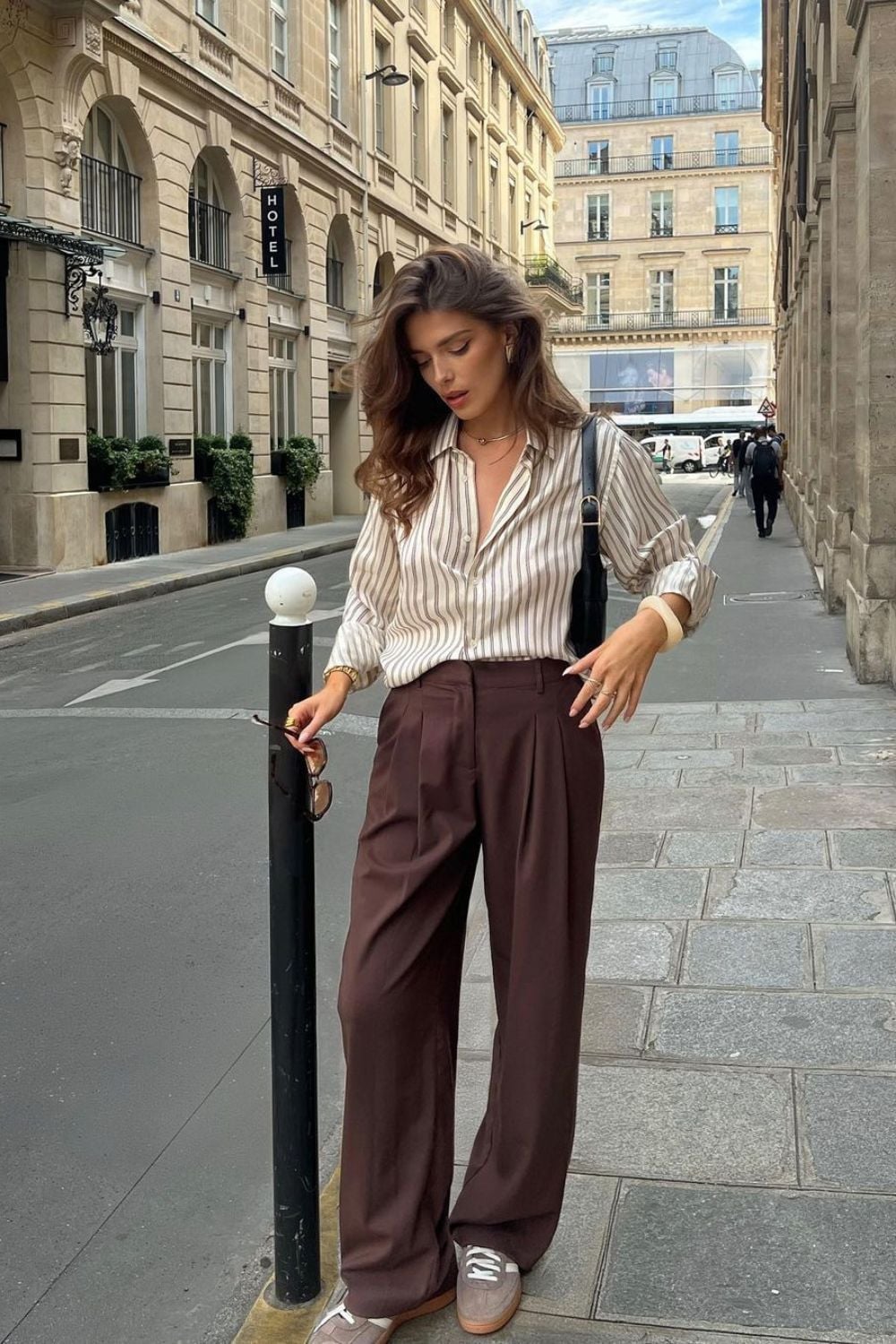 High-waisted Pleated Brown Wide-Leg Trousers with Striped Shirt — Classy Brown Pants Outfits