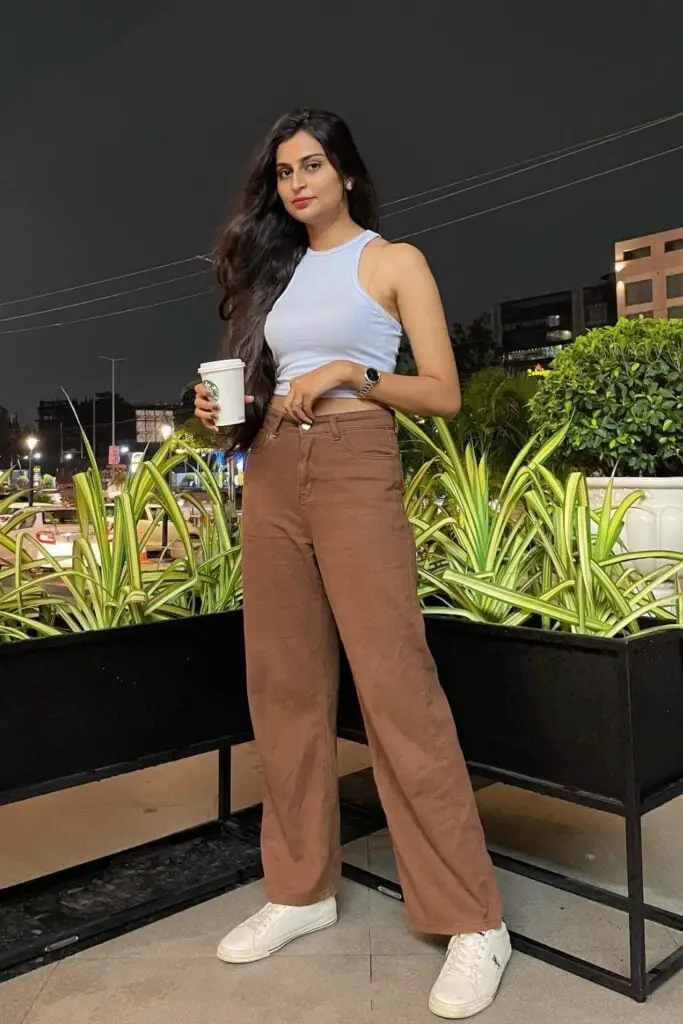 Brown Wide-Leg Trousers with a Light Blue Crop Top Brown Wide-Leg Trousers with a Light Blue Crop Top — Classy Brown Trousers Outfit