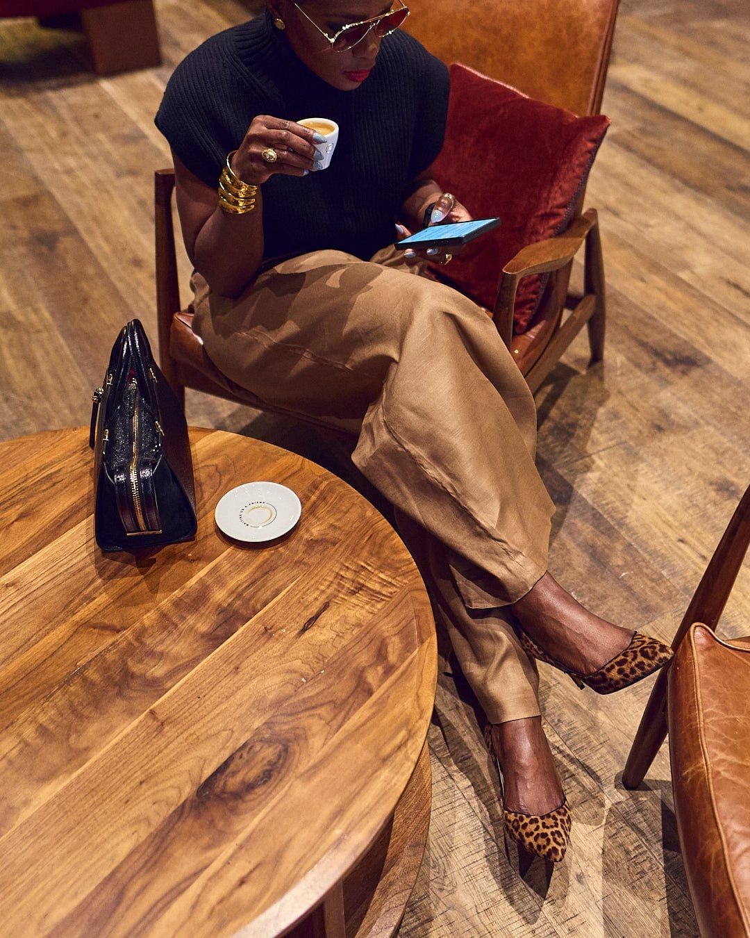 Brown Satin Wide-Leg Trousers with a Black Turtleneck, Glasses Brown Satin Wide-Leg Trousers with a Black Turtleneck, Glasses — Classy Brown Trousers Outfit