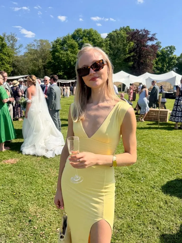 Butter Yellow Sleeveless Bodycon Dress with Deep V-Neck, Close-Up Take Butter Yellow Sleeveless Bodycon Dress with Deep V-Neck, Close-Up Take — Classy Butter Yellow Dress