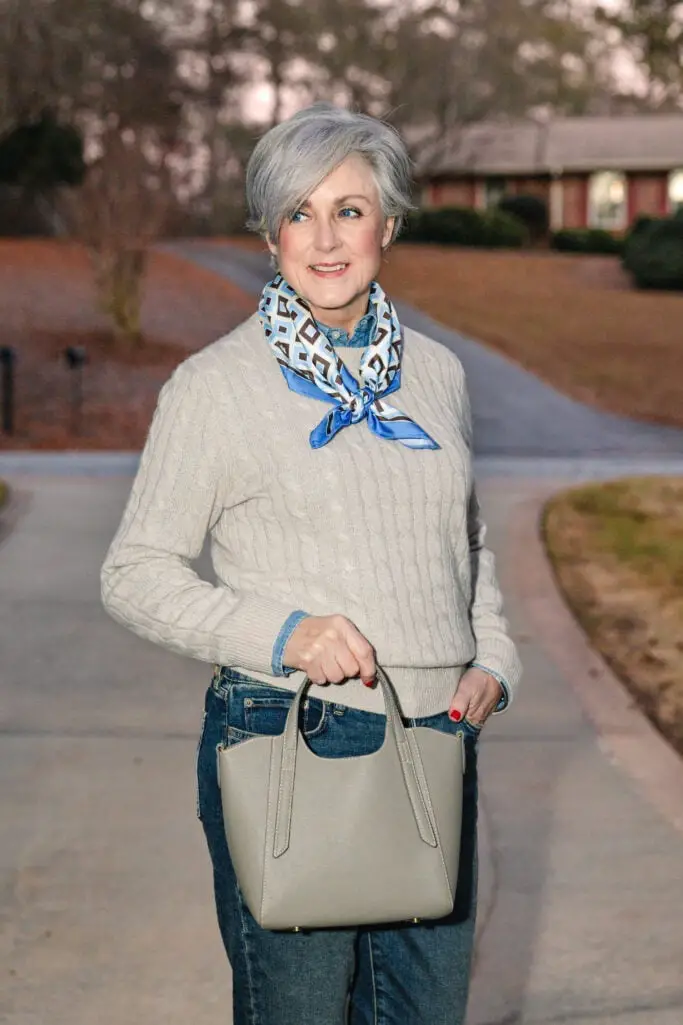 Beige Cable Knit Sweater Over Denim Shirt Adds Cozy Texture Beige Cable Knit Sweater Over Denim Shirt Adds Cozy Texture — Classy Capsule Wardrobe