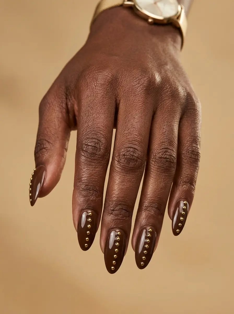 Rich Chocolate Oval Nails with Gold Studs Rich Chocolate Oval Nails with Gold Studs — Classy Chocolate Nails