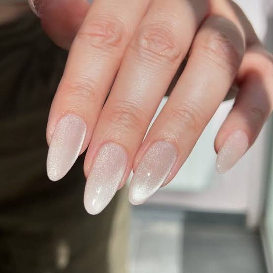 Short Almond Milky White Cat-Eye Shimmer Nails, Close-Up Take Short Almond Milky White Cat-Eye Shimmer Nails, Close-Up Take — Classy Clean Girl Nails