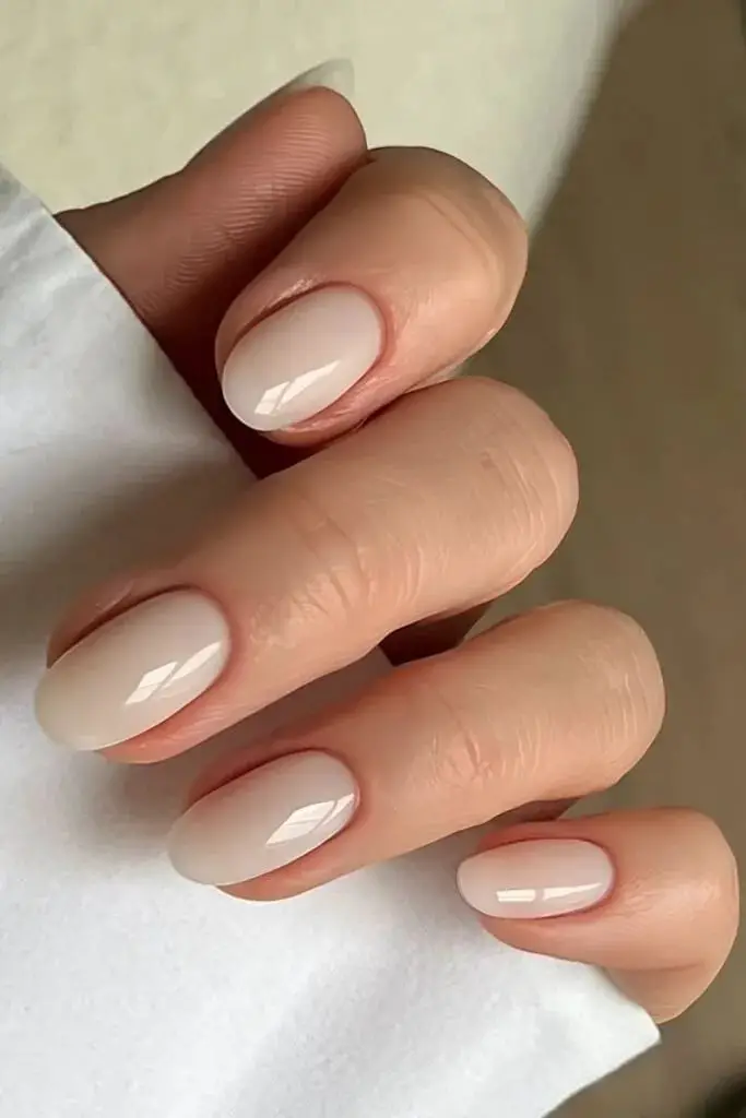 Short Oval Sheer Milky Nude Glossy Nails, Close-Up Take Short Oval Sheer Milky Nude Glossy Nails, Close-Up Take — Classy Clean Girl Nails