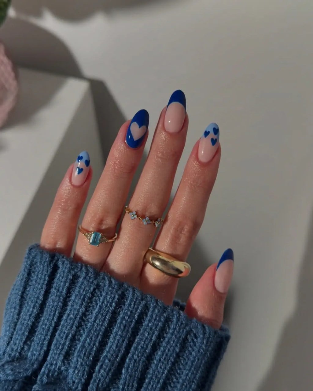 Sheer Nude With Blue French Hearts Medium Almond Nails Sheer Nude With Blue French Hearts Medium Almond Nails — Classy Concert Nails