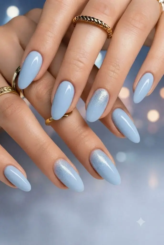 Milky Blue With Subtle Silver Glitter Medium Almond Nails Milky Blue With Subtle Silver Glitter Medium Almond Nails — Classy Concert Nails