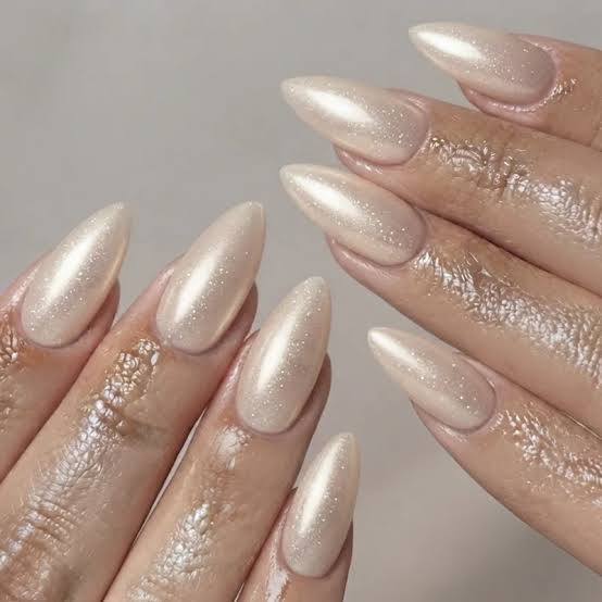 Milky White Silver Shimmer Glitter Medium Almond Nails, Close-Up Take Milky White Silver Shimmer Glitter Medium Almond Nails, Close-Up Take — Classy Concert Nails