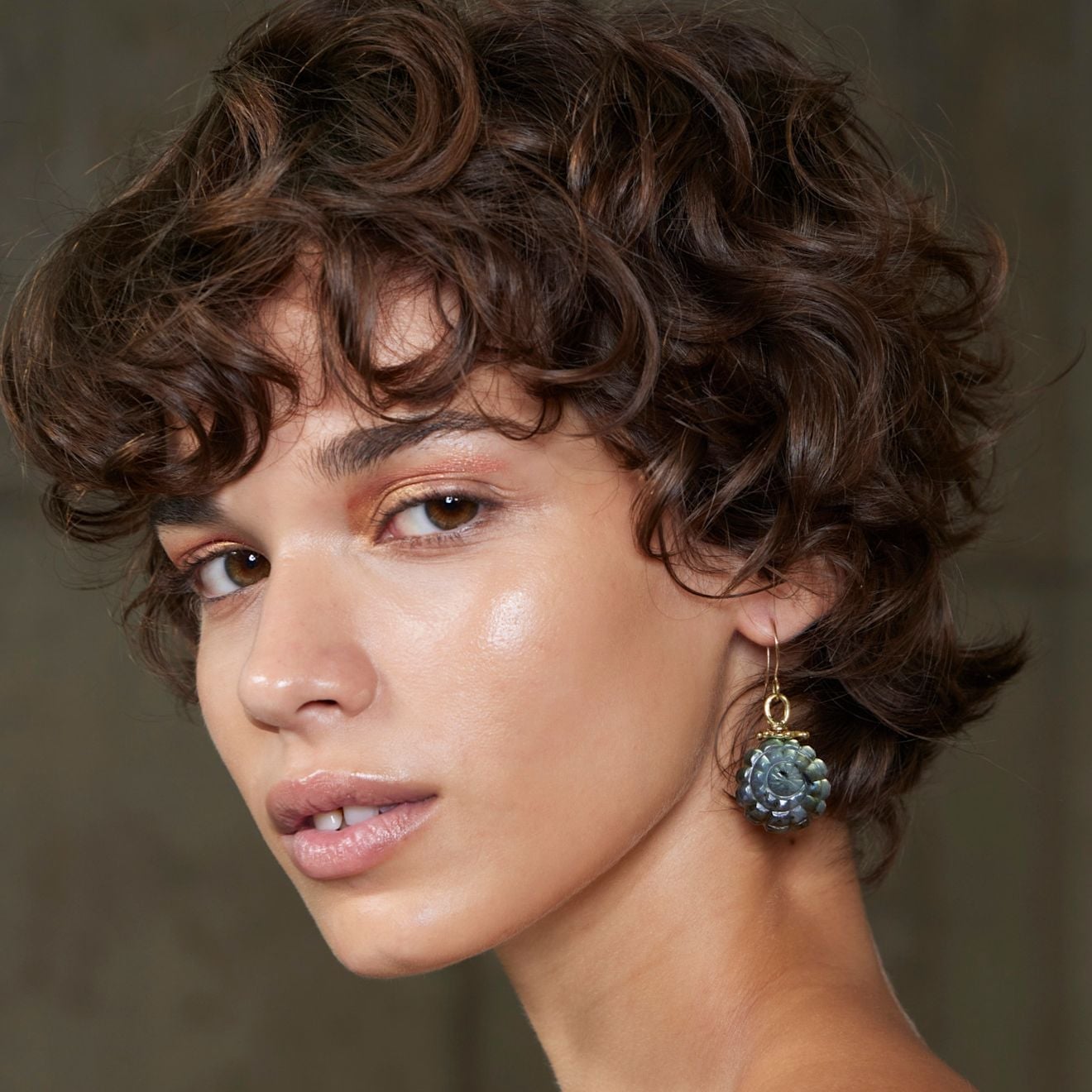 Textured Dark Brown Pixie Cut With Soft Bangs Textured Dark Brown Pixie Cut With Soft Bangs — Classy Curly Hair Cutting