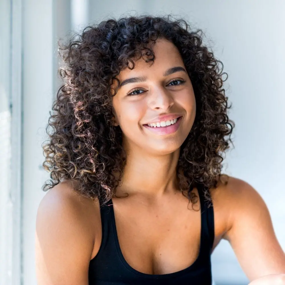 Collarbone Curls With Caramel Highlights, Layers Collarbone Curls With Caramel Highlights, Layers — Classy Curly Hair Hairstyles
