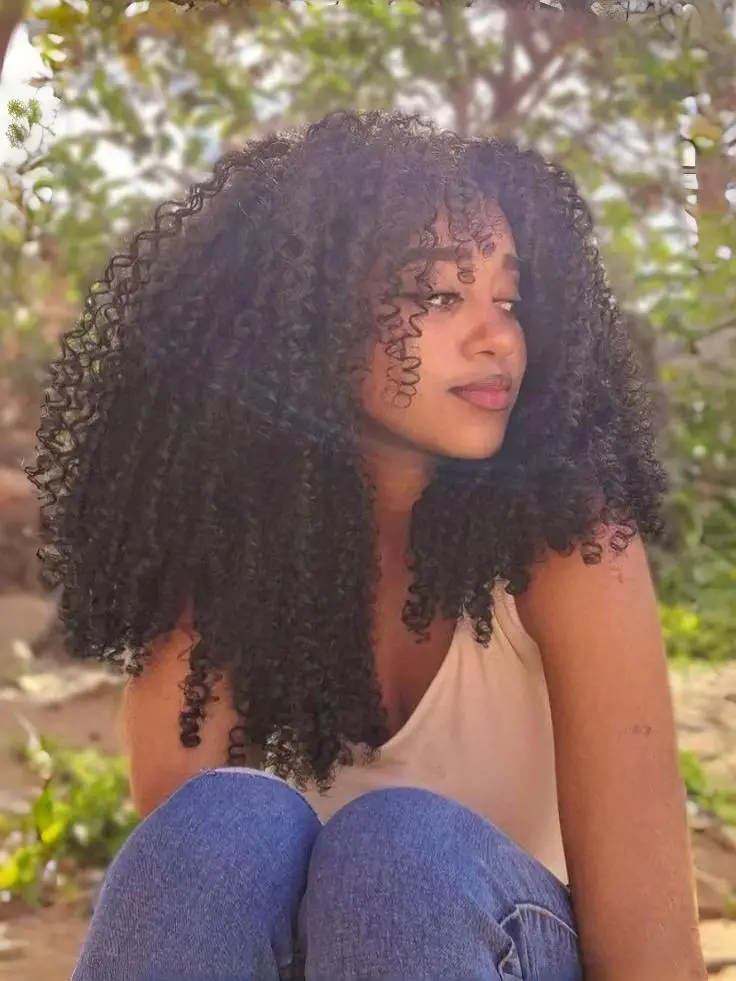 Mid-Back Layered Black Curls Mid-Back Layered Black Curls — Classy Curly Hairstyles for Black Women