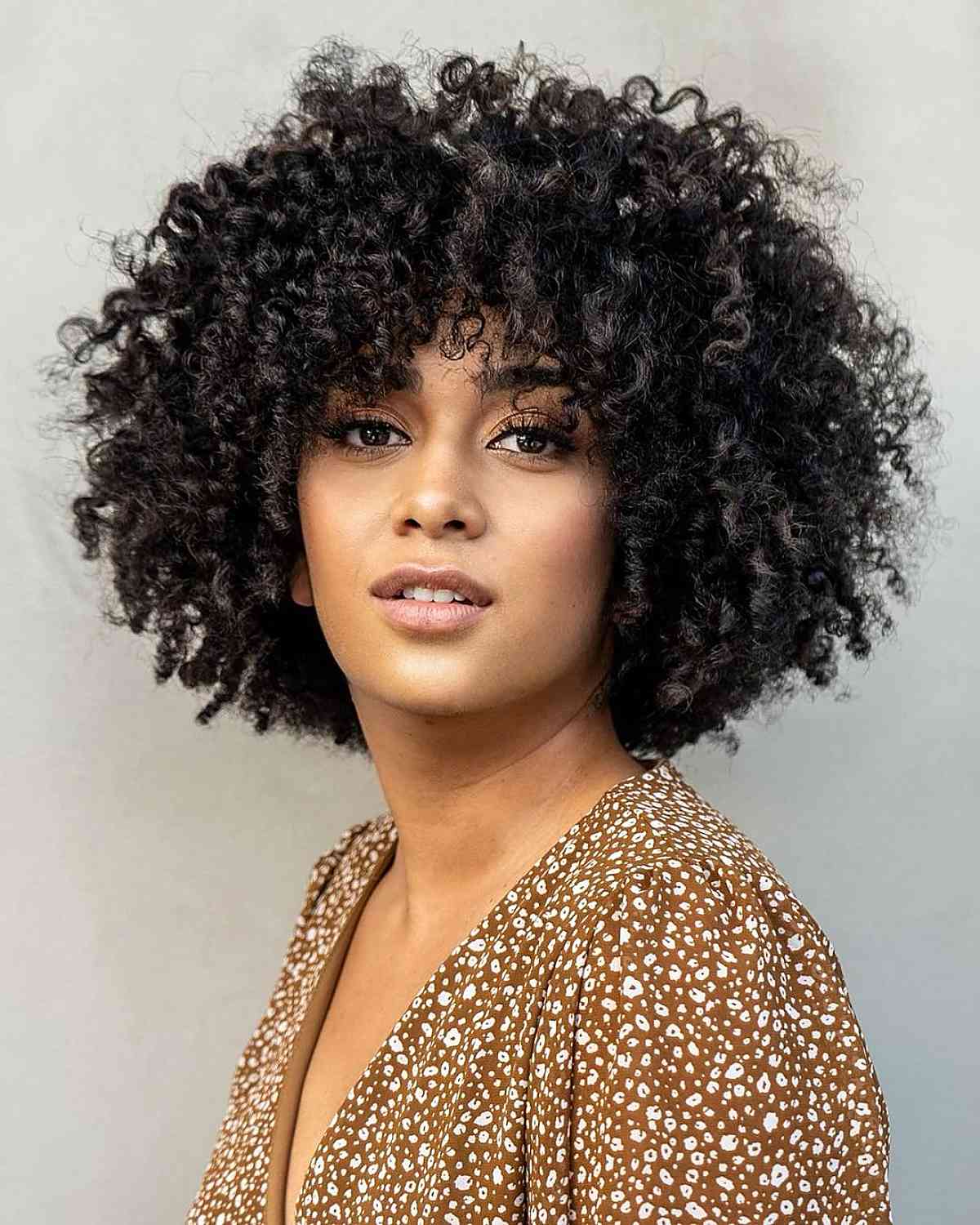 Short Voluminous Black Curly Cut Short Voluminous Black Curly Cut — Classy Curly Hairstyles for Black Women