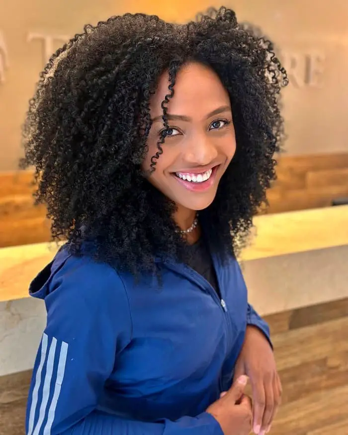 Shoulder-Length Layered Cut With Volume Shoulder-Length Layered Cut With Volume — Classy Curly Hairstyles for Black Women