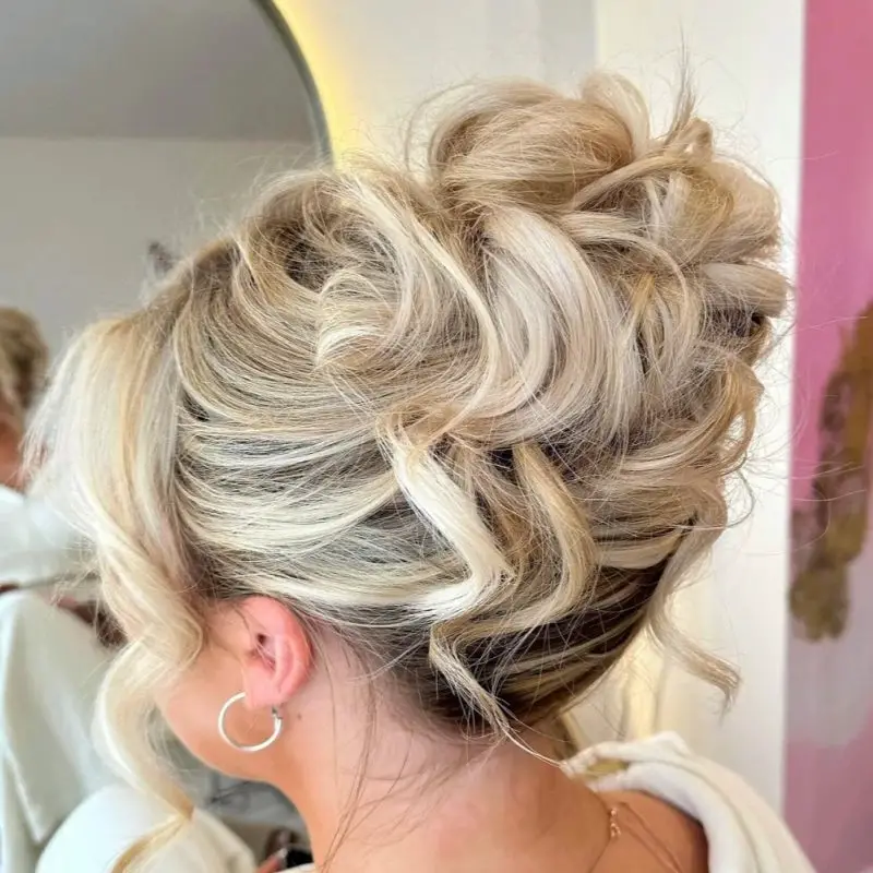 Textured Blonde Wavy Chignon Textured Blonde Wavy Chignon — Classy Curly Updo