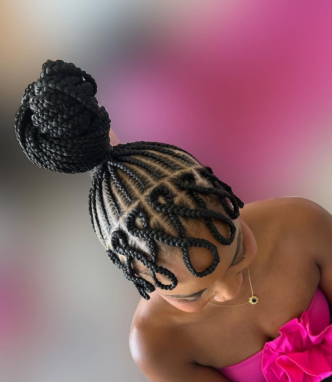 Black Braided Bun With Decorative Loops Black Braided Bun With Decorative Loops — Classy Dance Hair