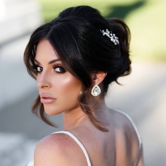 Dark Brown Updo With Side-Swept Bangs and Accessory — Classy Dance Hairstyles