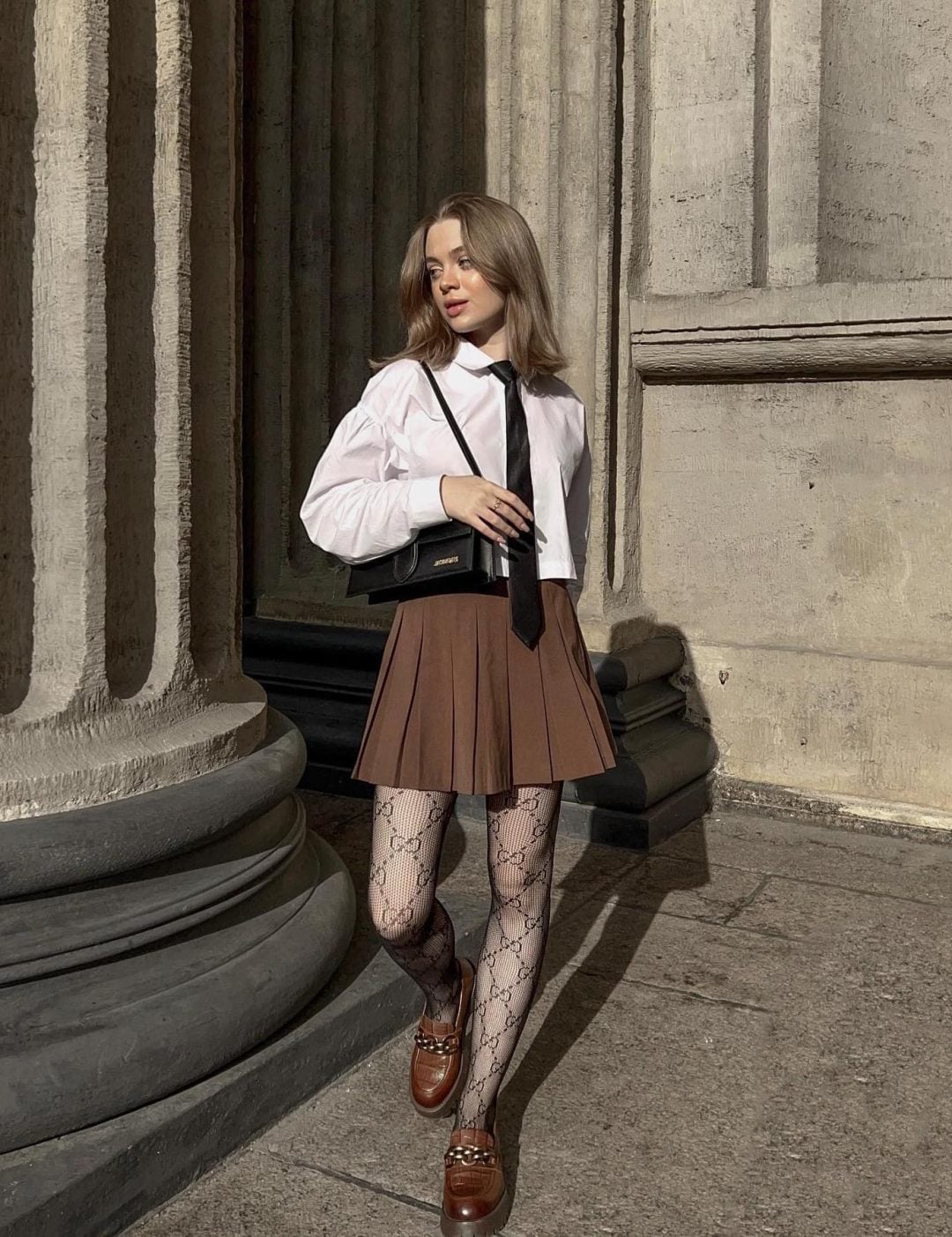 White Cropped Shirt with Black Tie and Brown Pleated Skirt — Classy Dark Academia Outfits