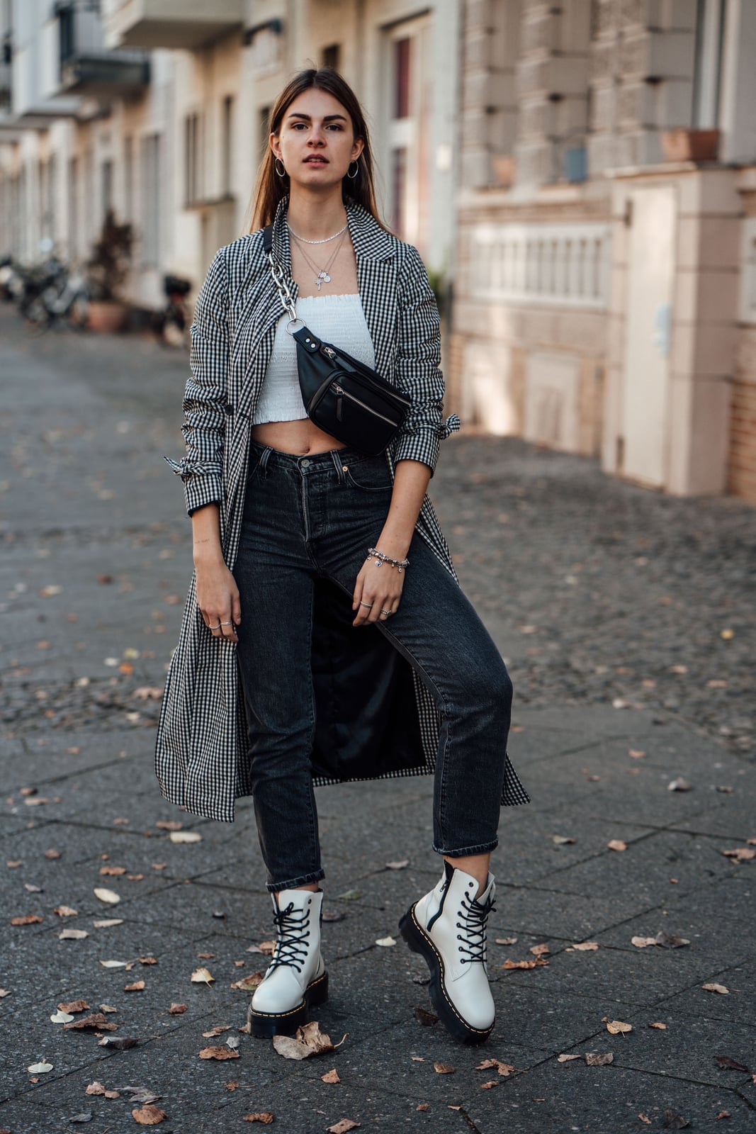Checked Trench Coat With White Crop Top And Charcoal Jeans Checked Trench Coat With White Crop Top And Charcoal Jeans — Classy Doc Martens Outfits