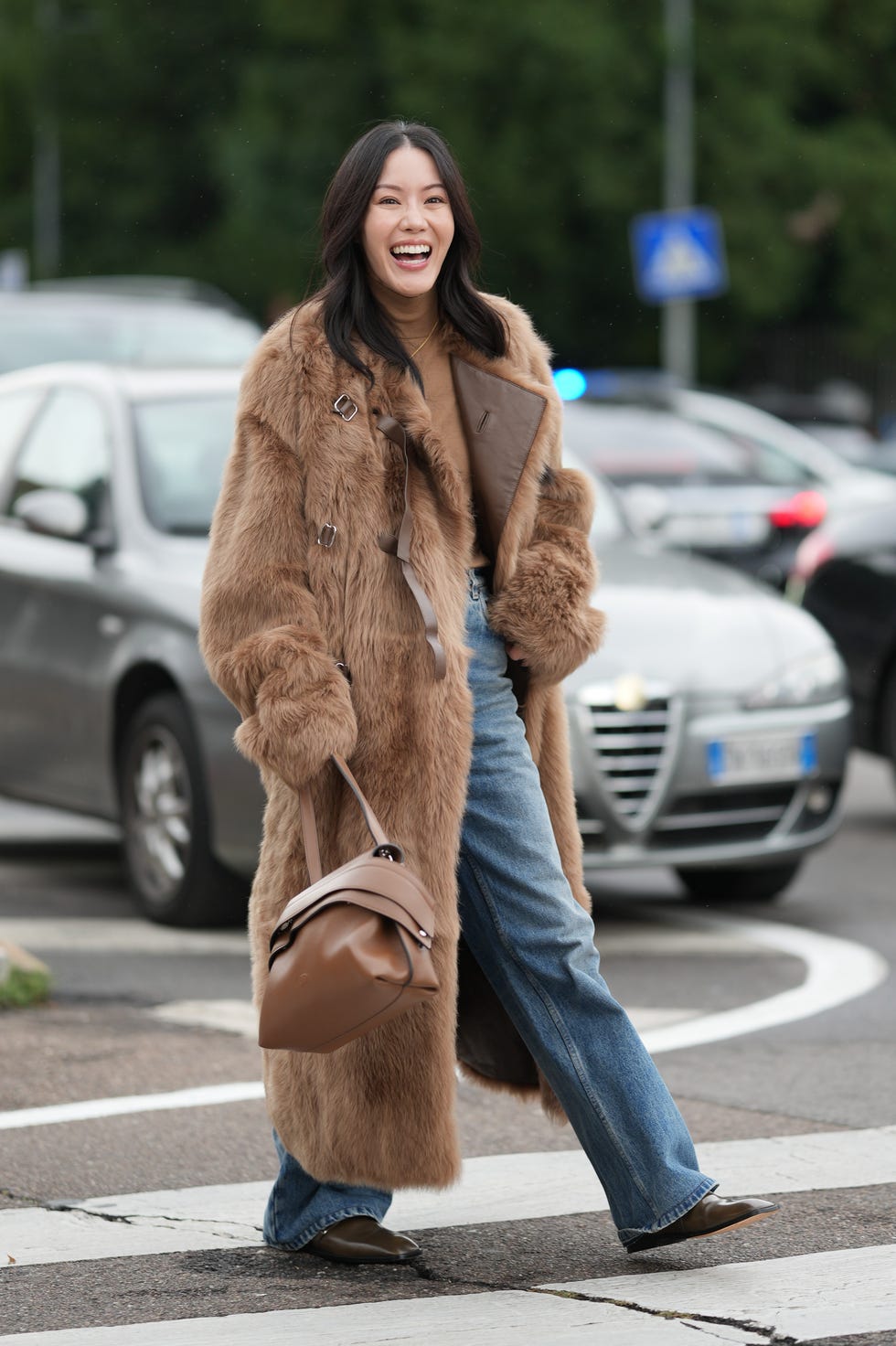 Voluminous Brown Faux Fur Coat Over Turtleneck and Jeans — Classy Fur Outfits