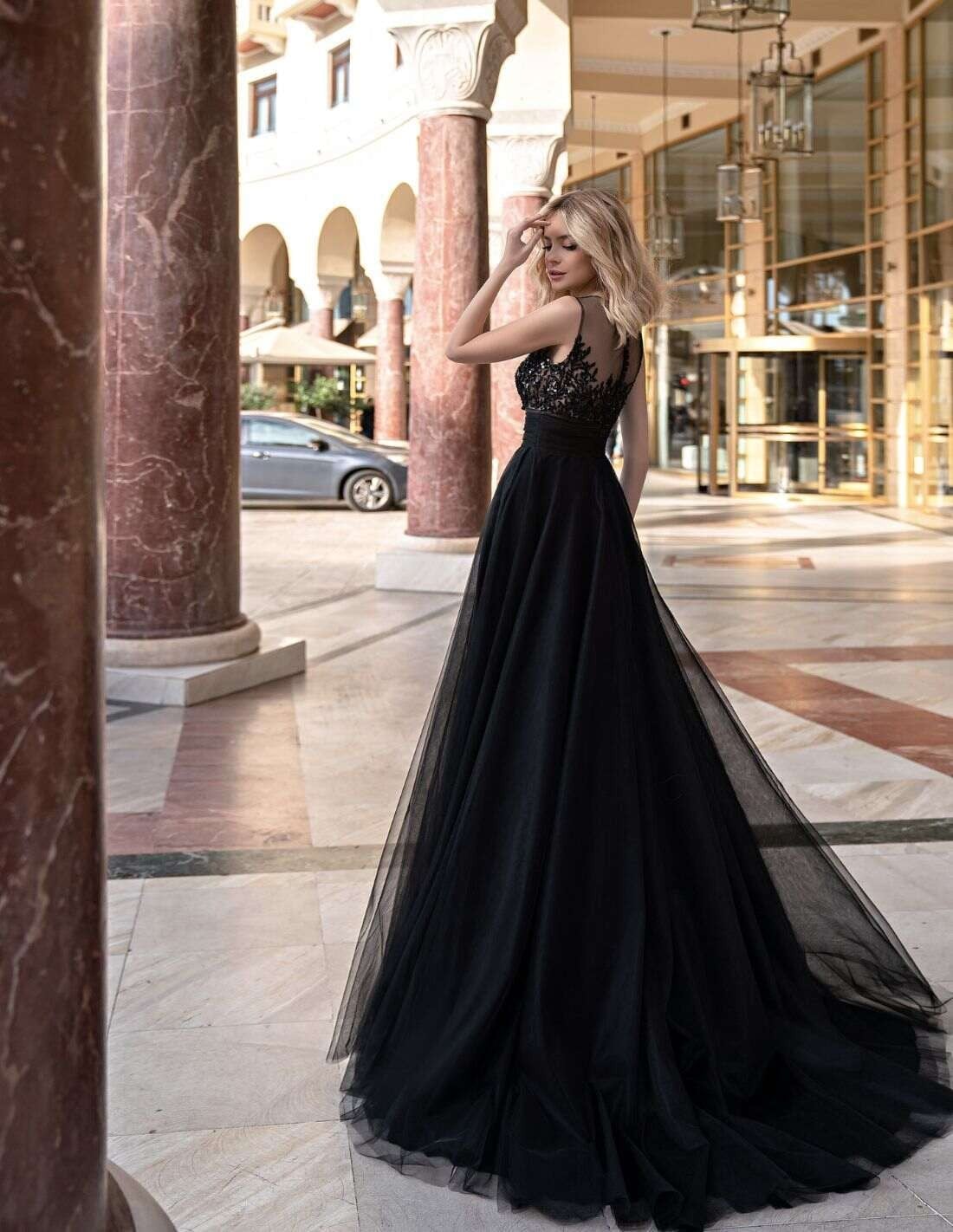 Black Lace Ballgown with High Neckline and Voluminous Tulle Skirt Black Lace Ballgown with High Neckline and Voluminous Tulle Skirt — Classy Gala Outfits