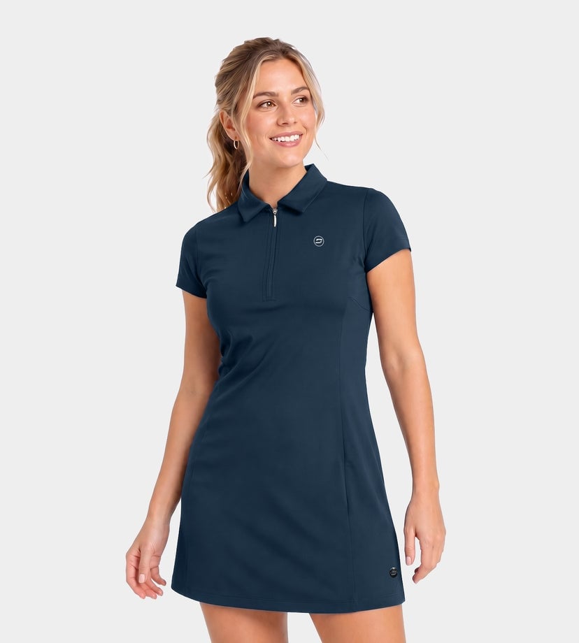 Navy A-line Polo Dress with Zipper Collar and She Wears White Sneakers — Classy Golf Outfits