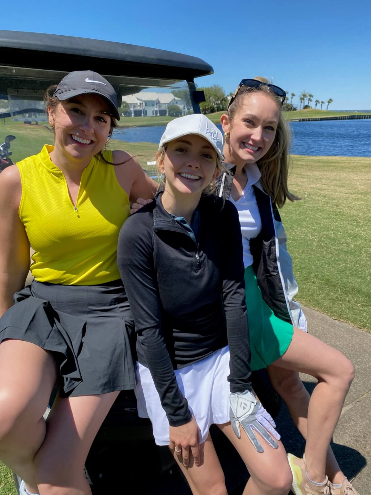 Yellow Sleeveless Polo and Black Skirt — Classy Golf Outfits