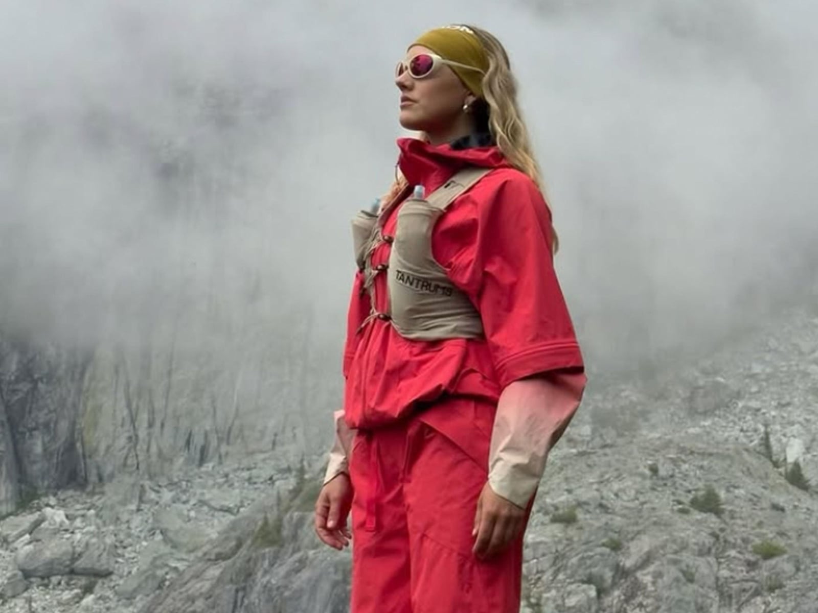 Bright Red Technical Jacket Over Beige Vest Bright Red Technical Jacket Over Beige Vest — Classy Gorpcore Outfits