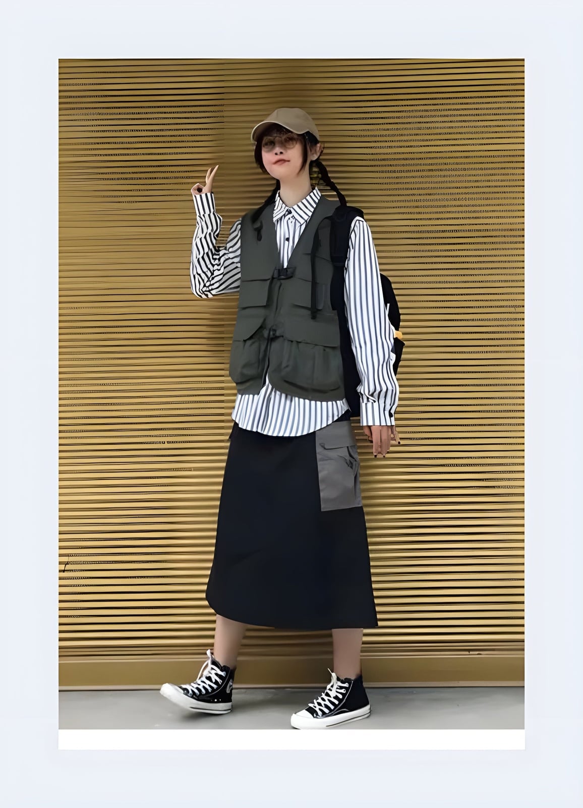 Gray Utility Vest Over Striped Shirt And Black Skirt Gray Utility Vest Over Striped Shirt And Black Skirt — Classy Gorpcore Outfits