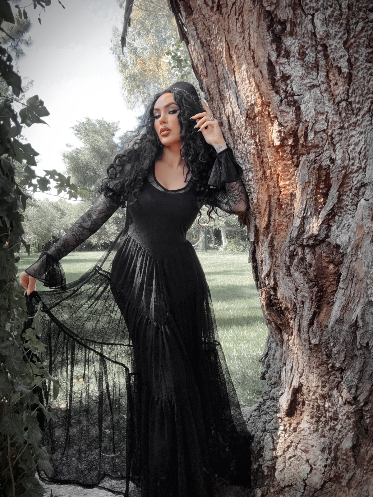 Flowing Black Lace Dress with Tiered Skirt and Bell Sleeves Flowing Black Lace Dress with Tiered Skirt and Bell Sleeves — Classy Gothic Style