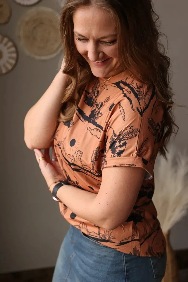 Fitted Tan Graphic Tee with Desert Print and Denim Skirt Fitted Tan Graphic Tee with Desert Print and Denim Skirt — Classy Graphic Tee Outfits