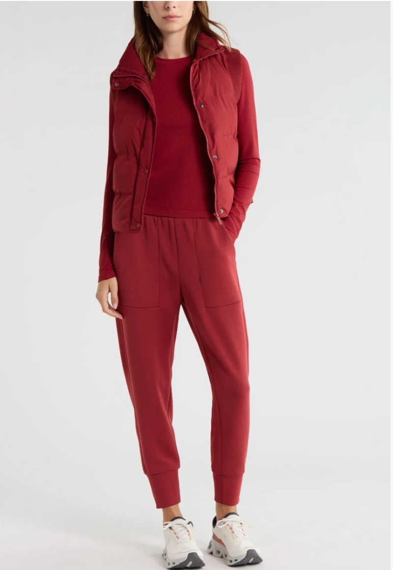 Red Puffer Vest Over Long-Sleeve Top and Sweatpants Red Puffer Vest Over Long-Sleeve Top and Sweatpants — Classy Gym Outfits