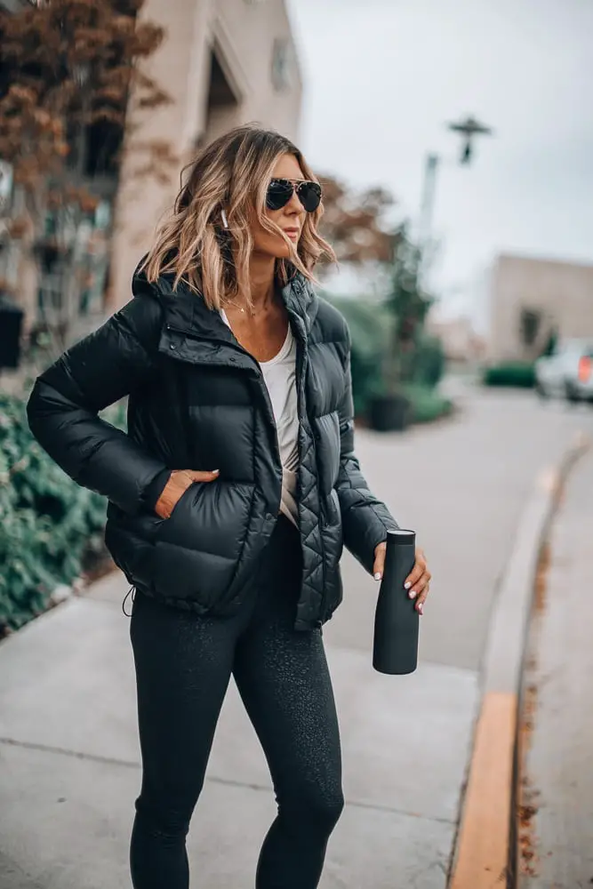 Black Puffer Jacket Over White T-Shirt and Gray, Close-Up Take Black Puffer Jacket Over White T-Shirt and Gray, Close-Up Take — Classy Gym Outfits