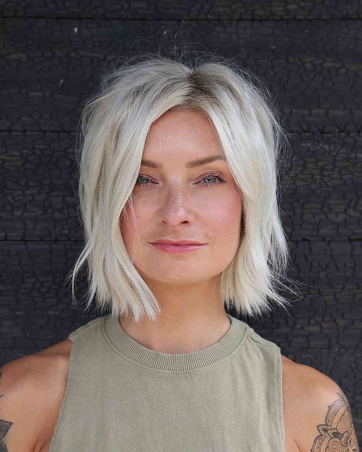 Platinum Shag With Wispy Bangs Platinum Shag With Wispy Bangs — Classy Hair Pictures