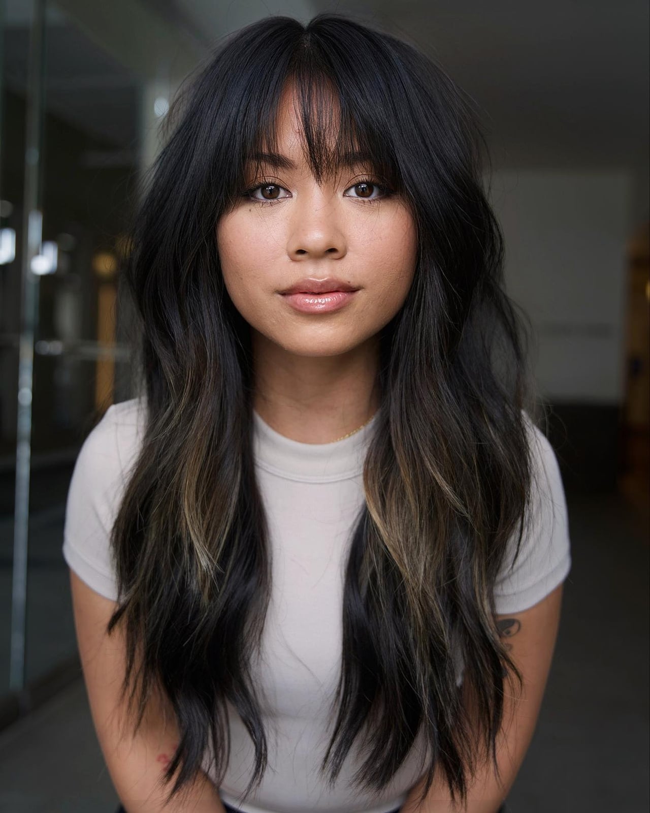 Mid-Back Wavy Hair With Full Bangs and Dark With Balayage Mid-Back Wavy Hair With Full Bangs and Dark With Balayage — Classy Hair with Bangs