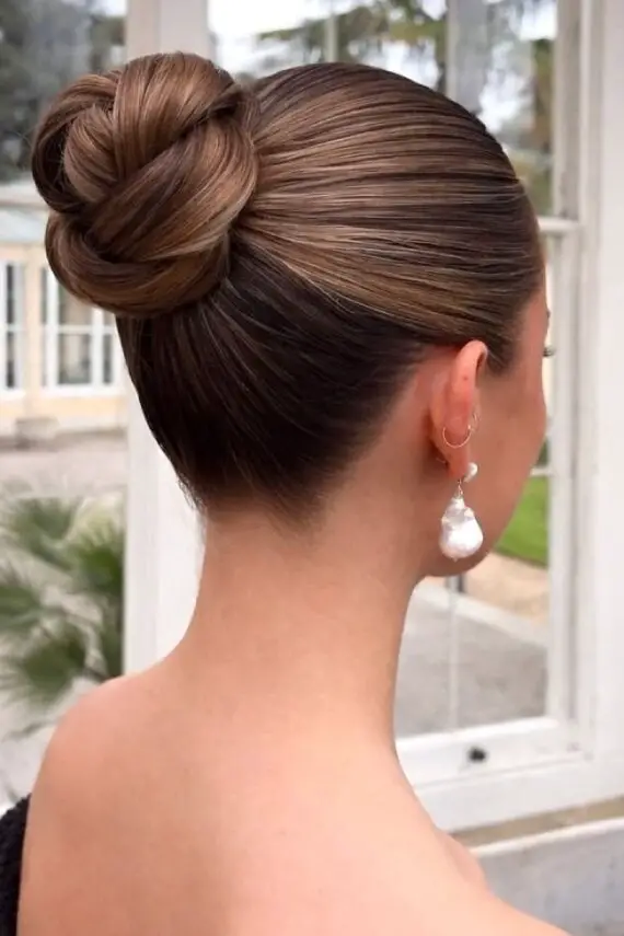 Sleek High Bun With Twisted Knot Sleek High Bun With Twisted Knot — Classy Hairstyles for Thick Hair