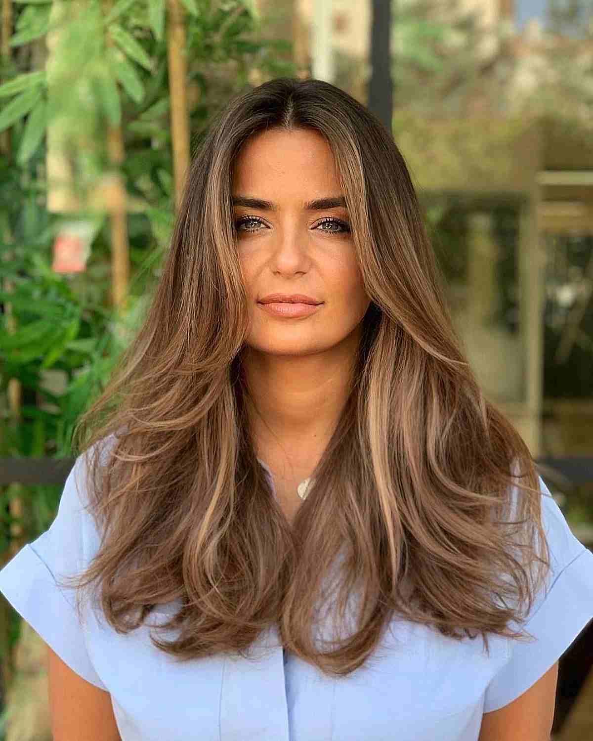 Mid-Back Layers With Voluminous Blowout Mid-Back Layers With Voluminous Blowout — Classy Hairstyles for Thick Hair