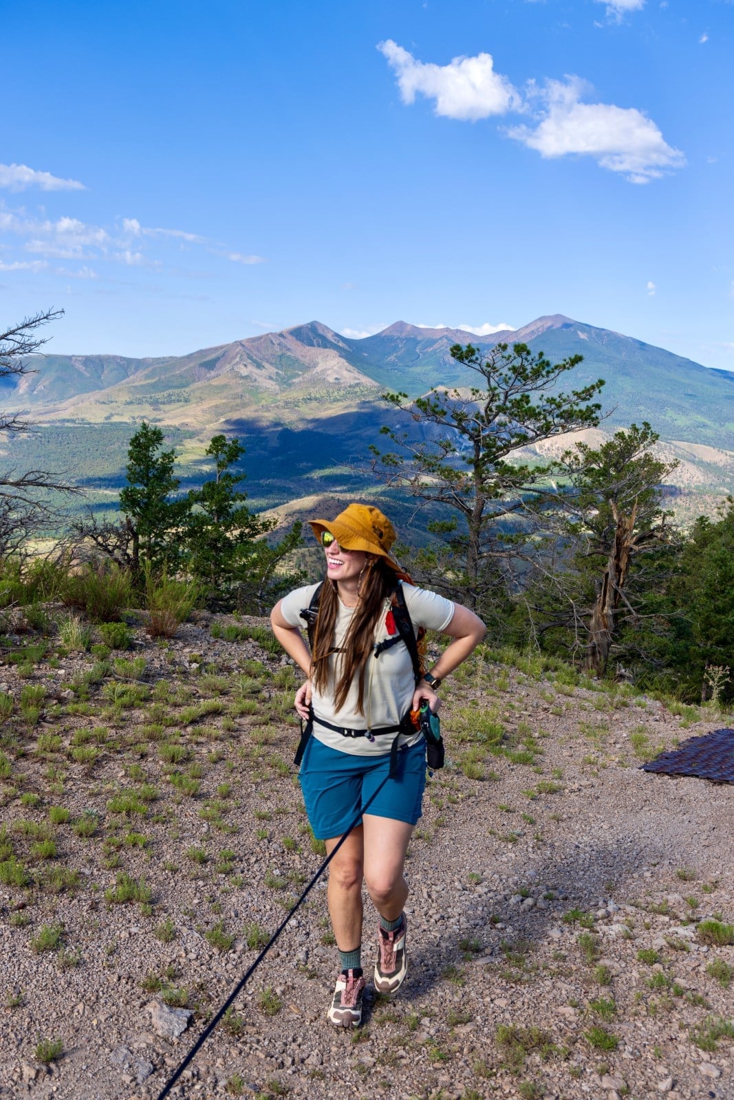Tan T-Shirt with Teal Shorts and Pink Hiking Shoes Tan T-Shirt with Teal Shorts and Pink Hiking Shoes — Classy Hiking Outfits