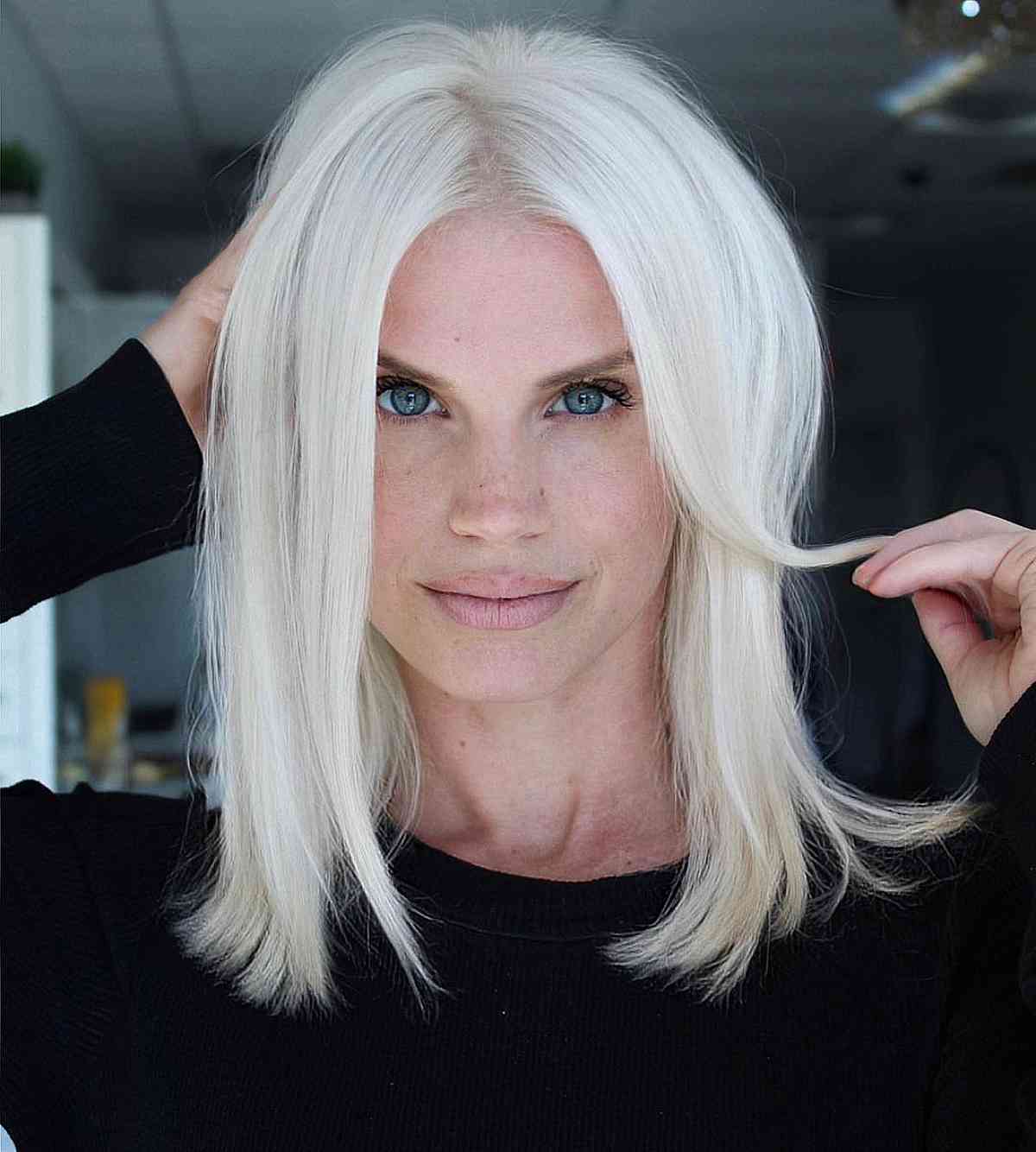 Collarbone Lob With Loose Waves and Curtain Bangs Collarbone Lob With Loose Waves and Curtain Bangs — Classy Icy Blonde Hair