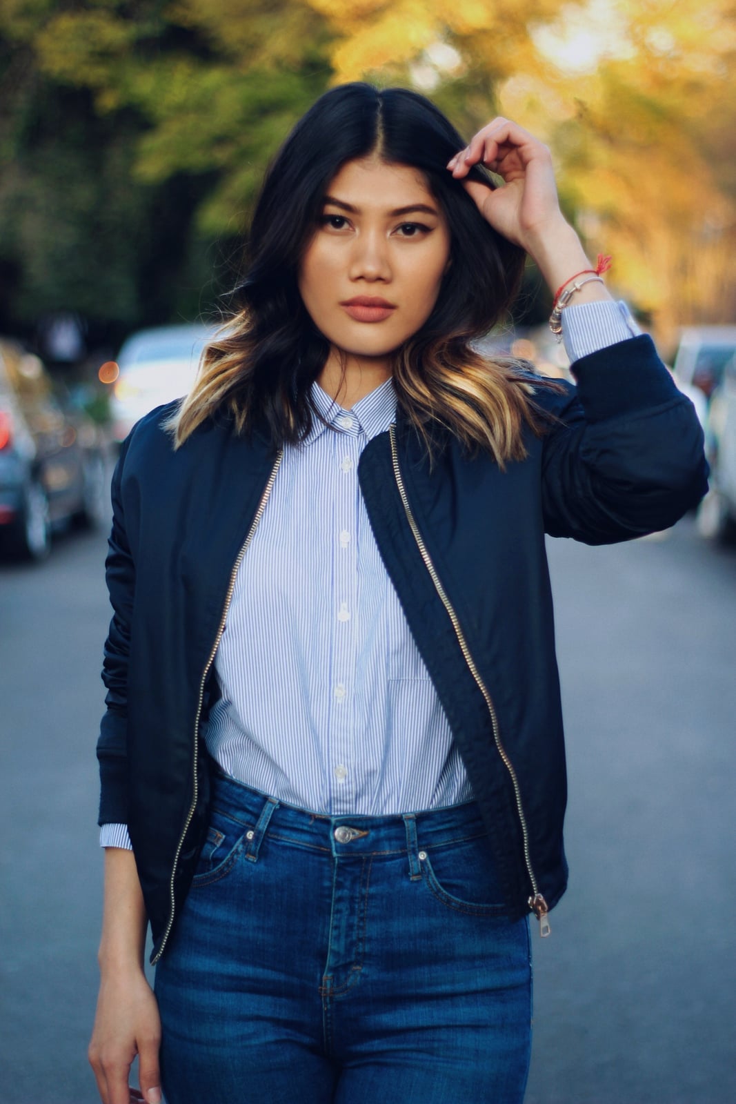Navy Bomber Jacket with Striped Shirt and Jeans Navy Bomber Jacket with Striped Shirt and Jeans — Classy Jacket Outfits